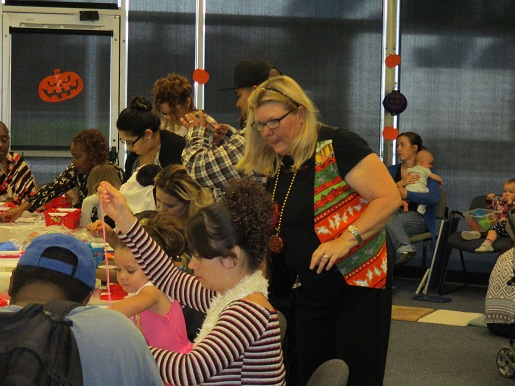 The families are making story baskets